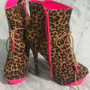 Pink bottom high heeled boots